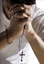 Man Praying Rosary
