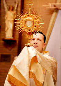 Priest with Monstrance