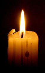 Candle in darkness